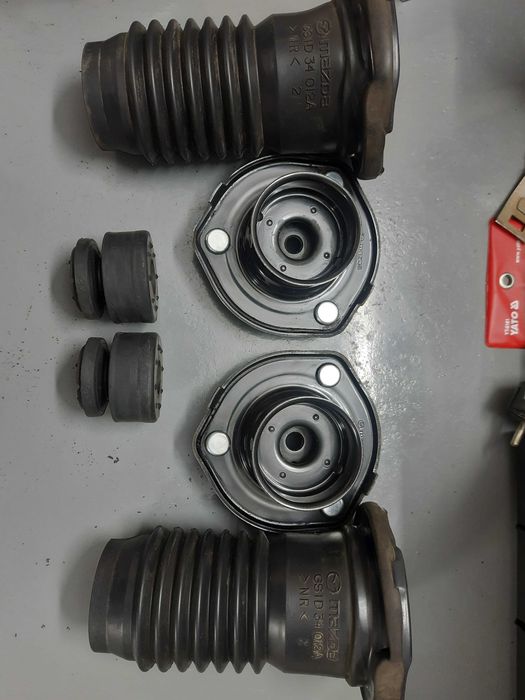 Опора амортизатора переднього на мазду 6.