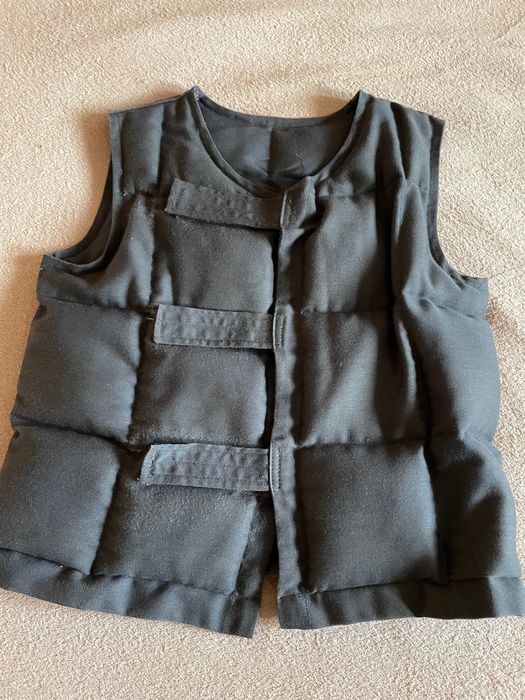 Утяжуюча  желетка.