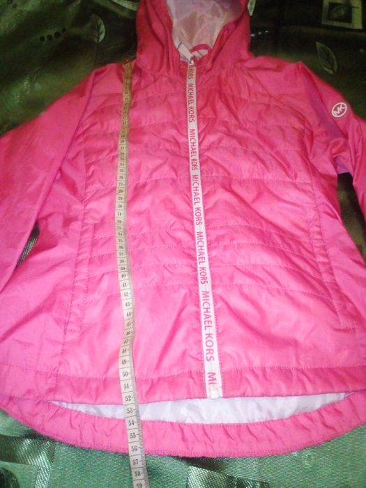 Курточка майже як нова.на ріст 130-145