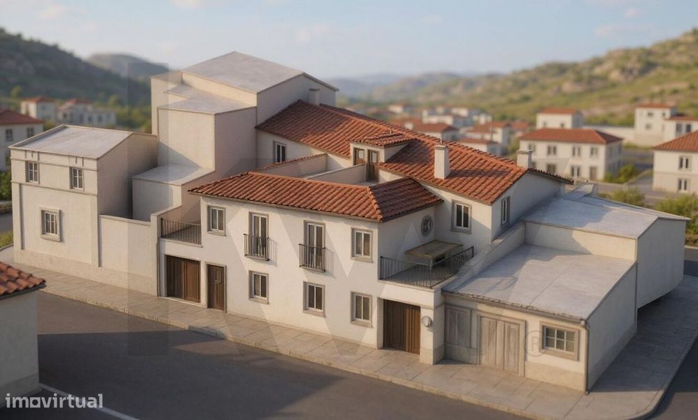 Terreno com projeto aprovado para duas moradias geminadas no centro hi