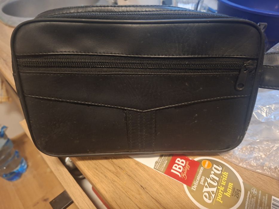 Saszetka męska  skórzana na rękę