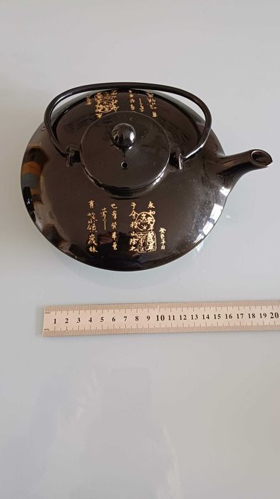 Bule de chá oriental com duas taças