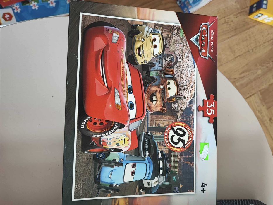 Puzzle 4+ auta trefl - 4 pudełka - 8 wzorów