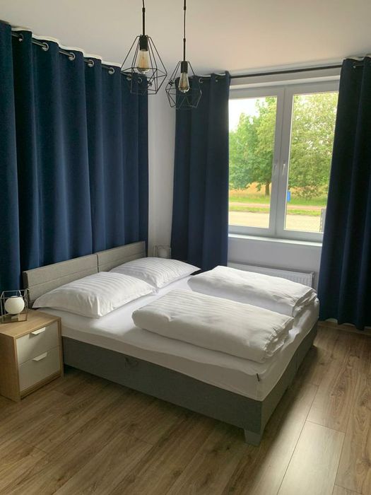 Aartamenty i pokoje z miejscem parkingowym i Jakuzzi