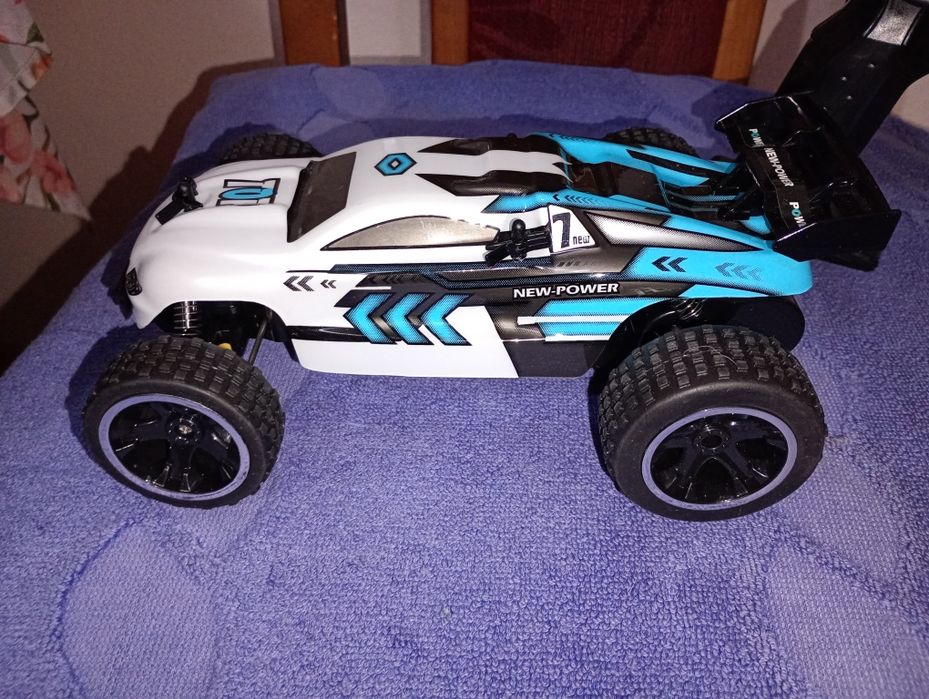 Samochód zdalnie sterowany  TECNOCK QY1802A 2.4 GHz skala 1:22