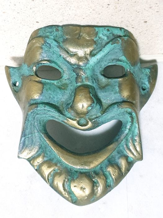 Interessantes mascaras de suspensão mural vintage em bronze