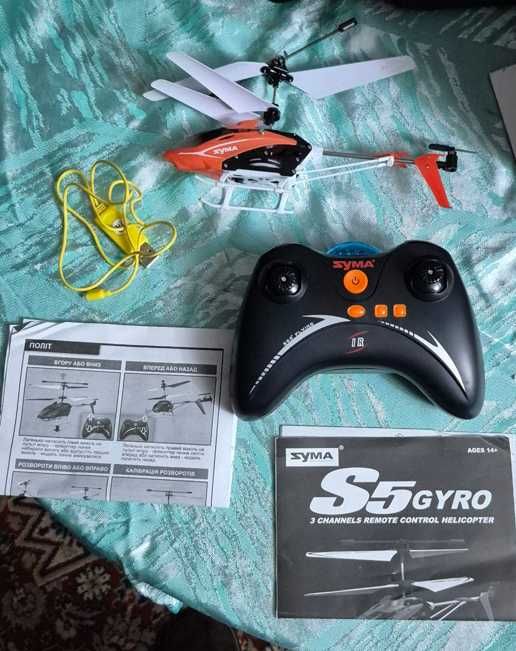 Вертолет Syma на управлении