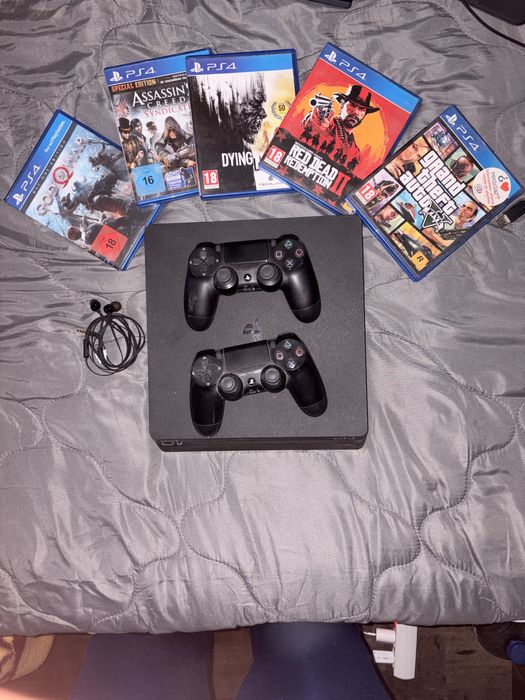 Playstation 4 com jogos e fones