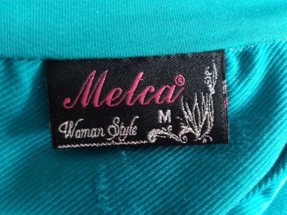 Жіноча спортивна безрукавка