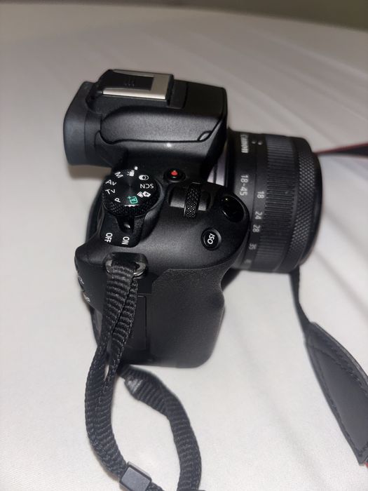 ítulo: Canon EOS R50 como nova + lente 18–45mm – 680€