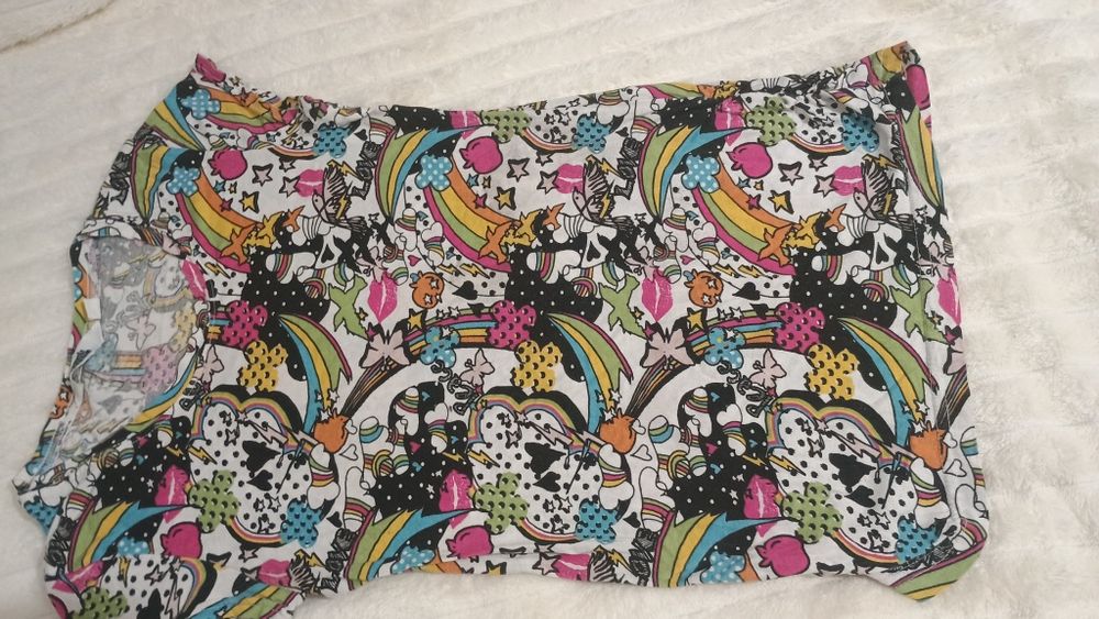 Koszulka dłuższą tunika 134 kolorowa stan dobry