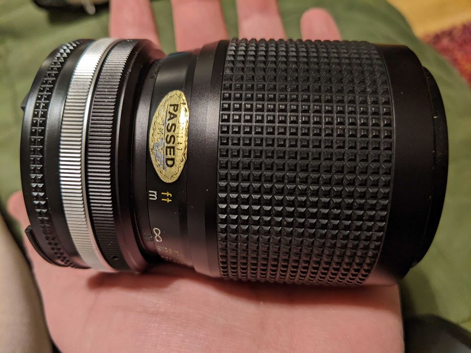 Об'єктив Nikkor-zoom  для фотокамер Nikon вінтаж монуал