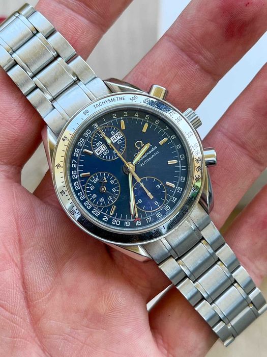 Omega Speedmaster Triple Date Automatic Day-Date granatowa tarcza zegarek automatyczny ref. 3523.80.00 39mm