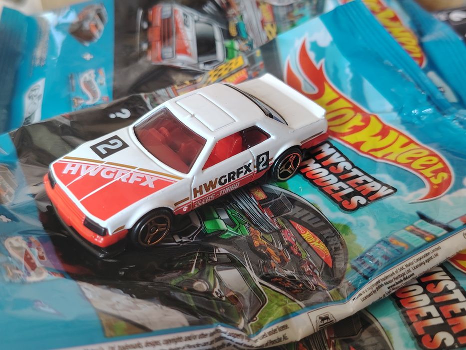 82 Nissan skyline R30 hot wheels Mistery Modelos  com embalagem stiker