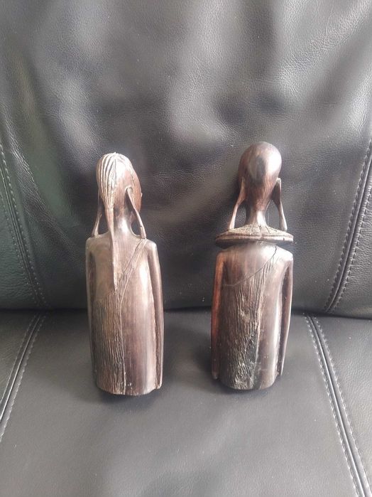 Par de estatuetas em pau preto. "Homem e Mulher"