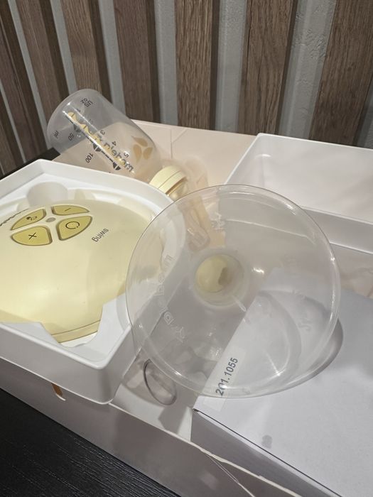 Молоковідсмоктувач Medela swing + calma