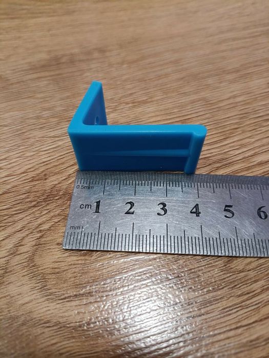 Фіксатор підвіконня