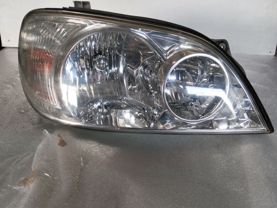 Farol Kia carnival 2 ótica original 2003  facelift