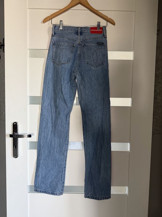 Świetne spodnie Calvin Klein prosta nogawka roz W25xL32