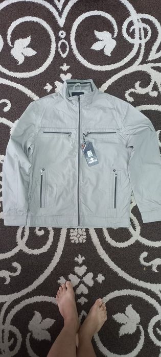 Нова чоловіча вітровка