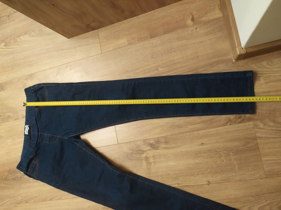 Spodnie damskie jeansy Clock house 38