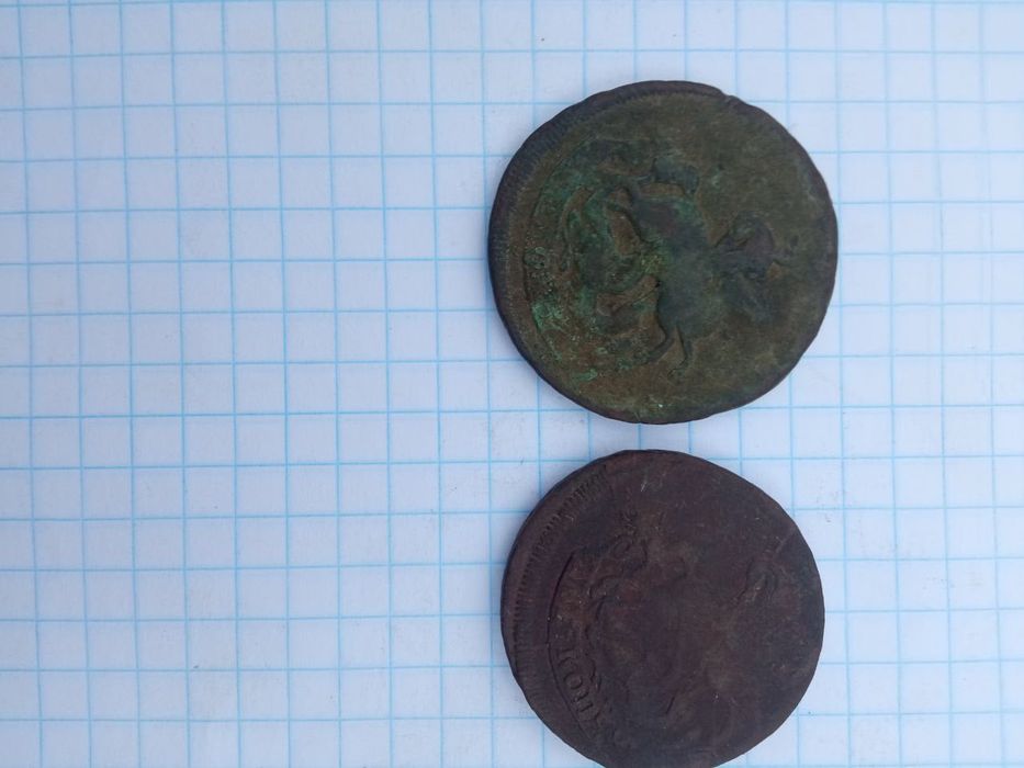 Монети         .