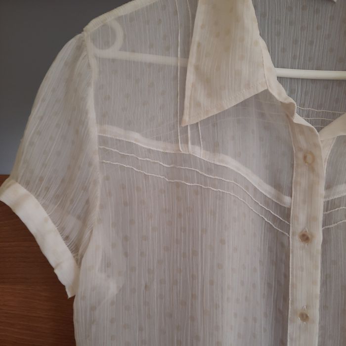 Bluzka damska transparentną w groszki rozm.42