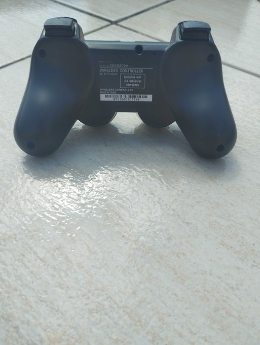PlayStation 3 Super Slim + Comando DualShock Revisto