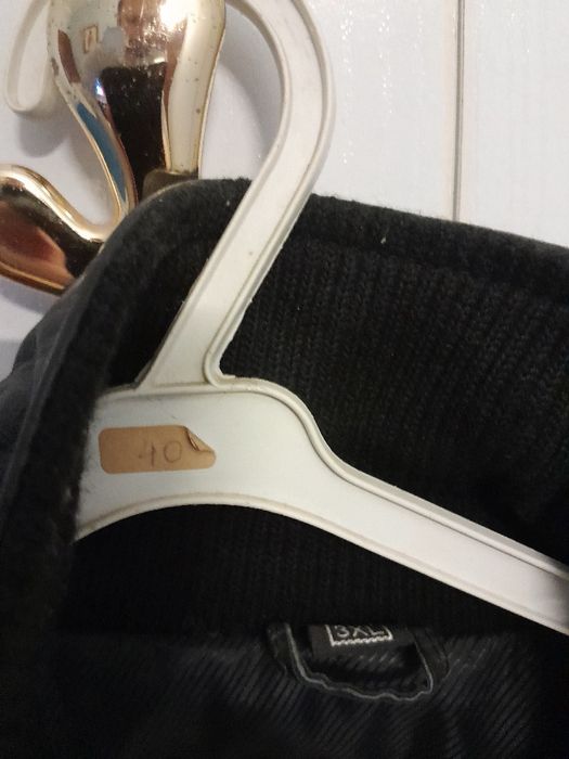 Casaco novo em pele.