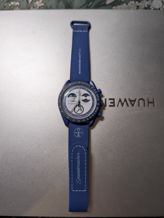 Swatch x omaga Snoopy mission to earthphase
