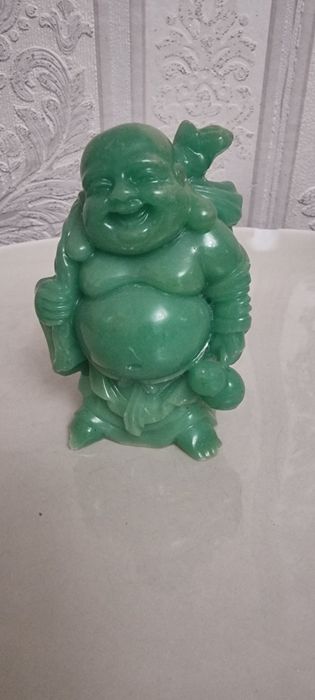 Статуетка Будди .