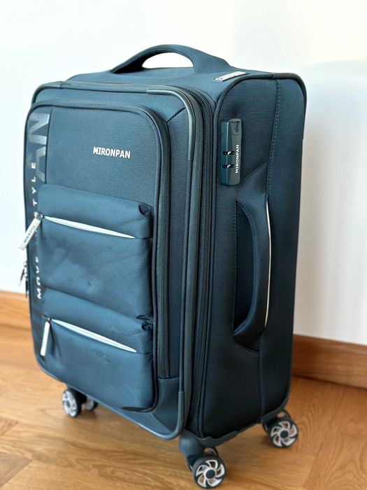 Średnia walizka podróżna 70x44x28 cm, rozszerzana, 360° kółka, zamek