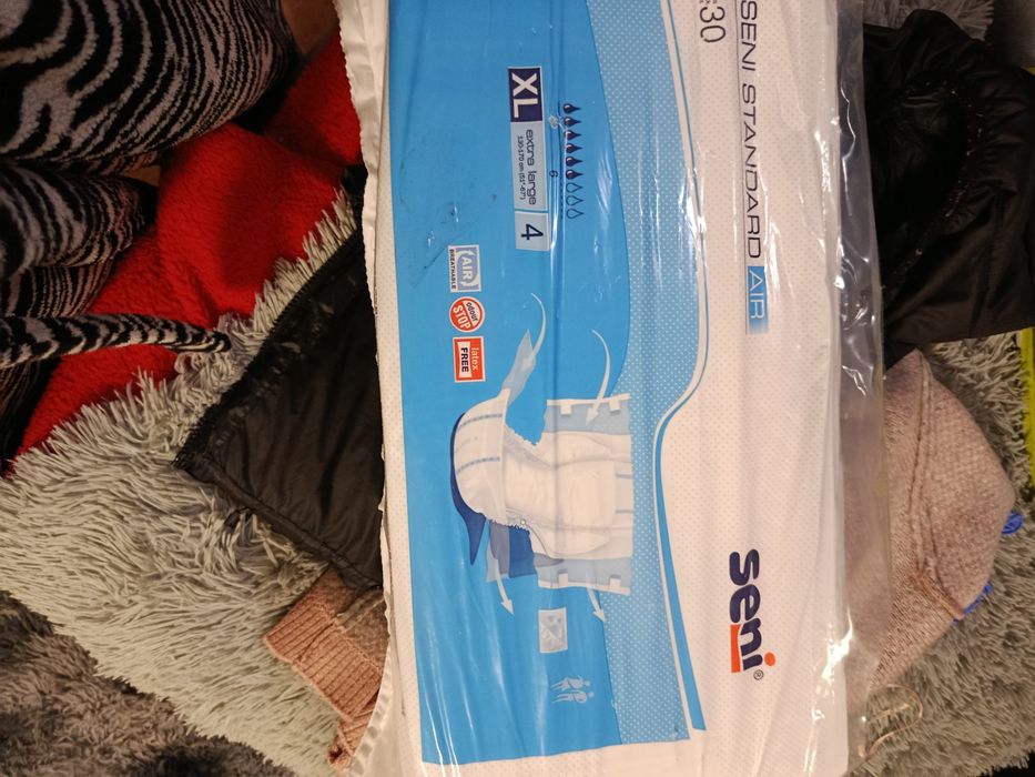 Продам памперсы XL.