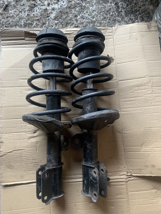 Передние стойки амортизаторы Шевроле Авео заз вида опоры пружины СТО