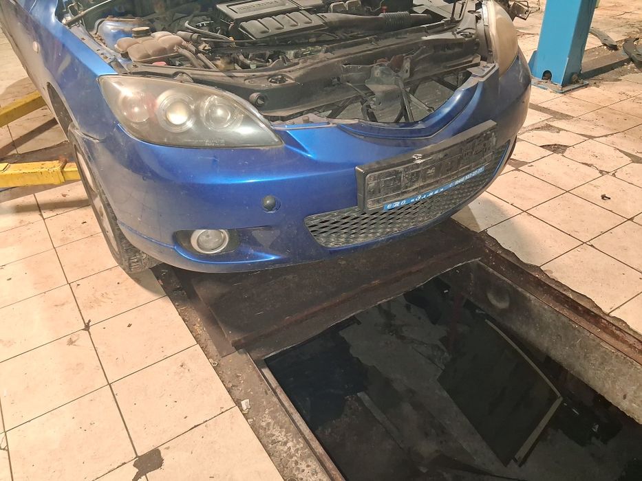 Бампер передній Mazda 3 BK хетчбек 2003 2009