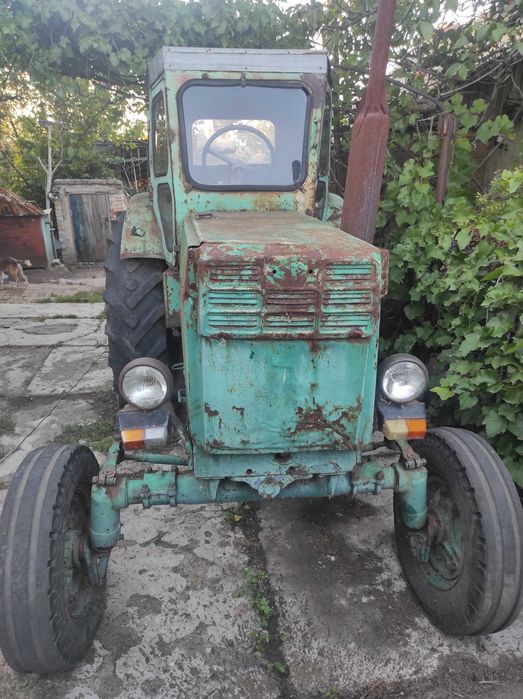 Трактор т40ам з плугом та дисками