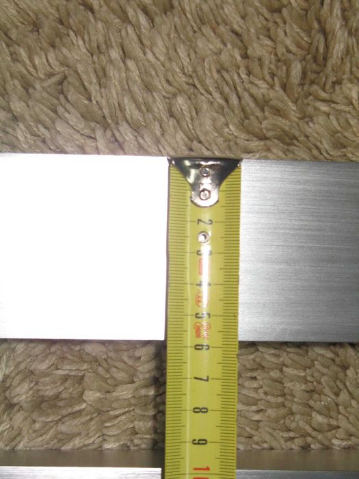 Iluminação em inox e vidro fosco