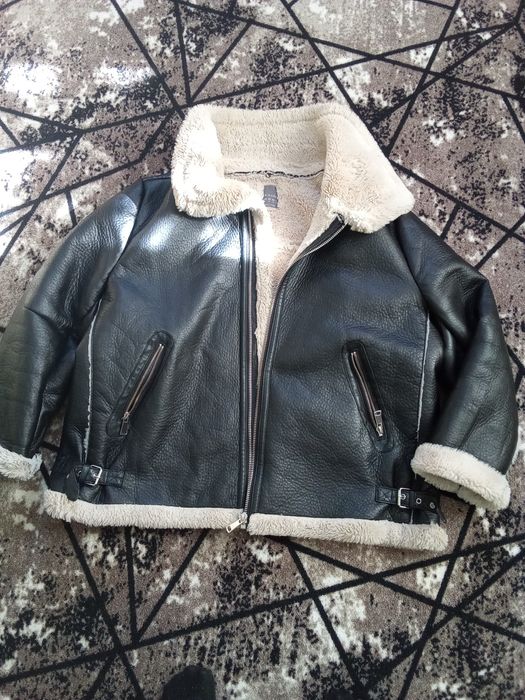 Жіночі  куртки і пальта .