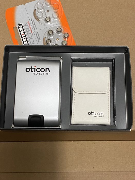 Слуховые аппараты  Oticon