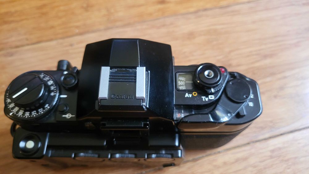 Zestaw aparat Canon A1, obiektyw, komplet konwerterów i torba