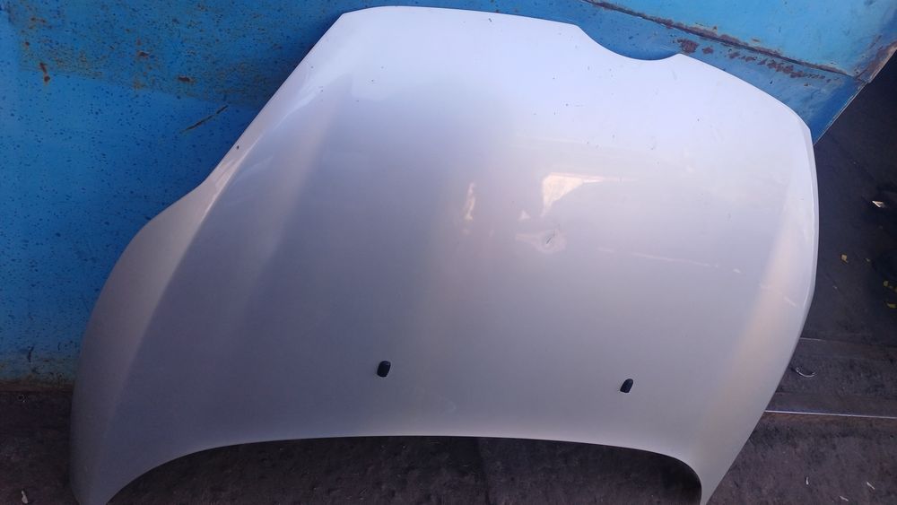 капот форд фієста сірий