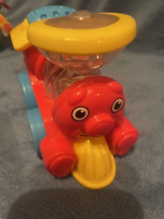 Іграшки від 6міс(пірамідка Tomy,паровозик FisherPrice, музич Пінгвін