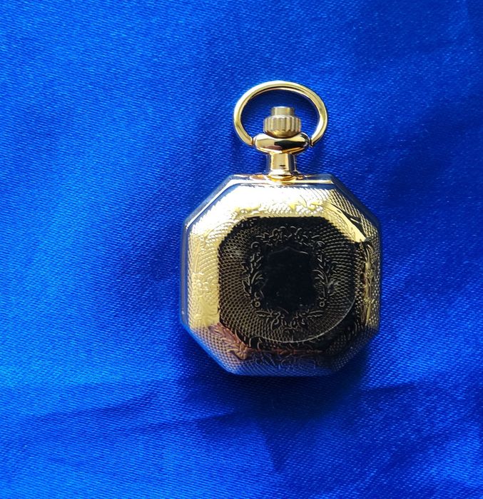 2126#Relogio bolso quartz Novo com pilha a trabalhar nunca foi usado