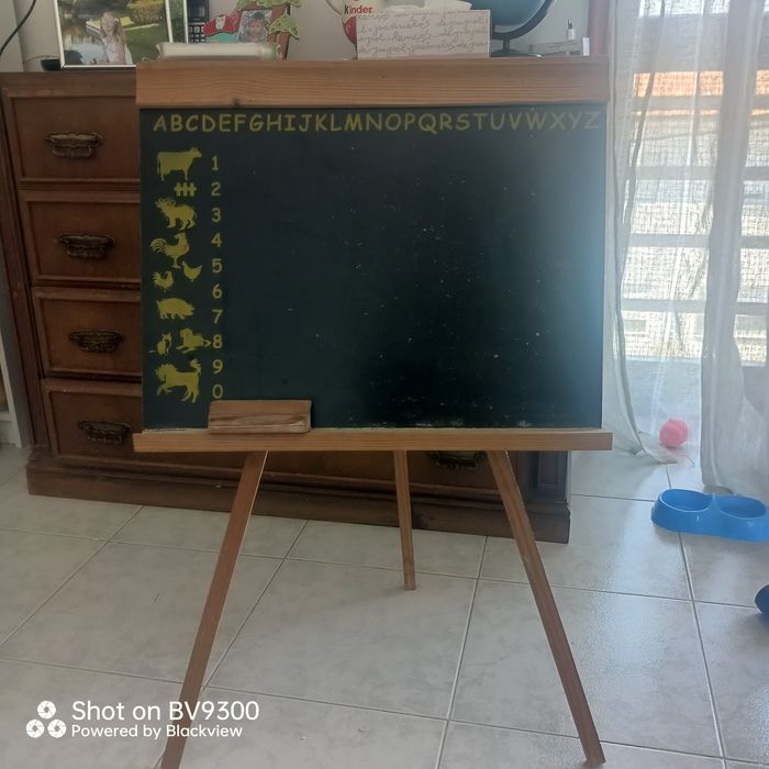 O quadro giz de criança.