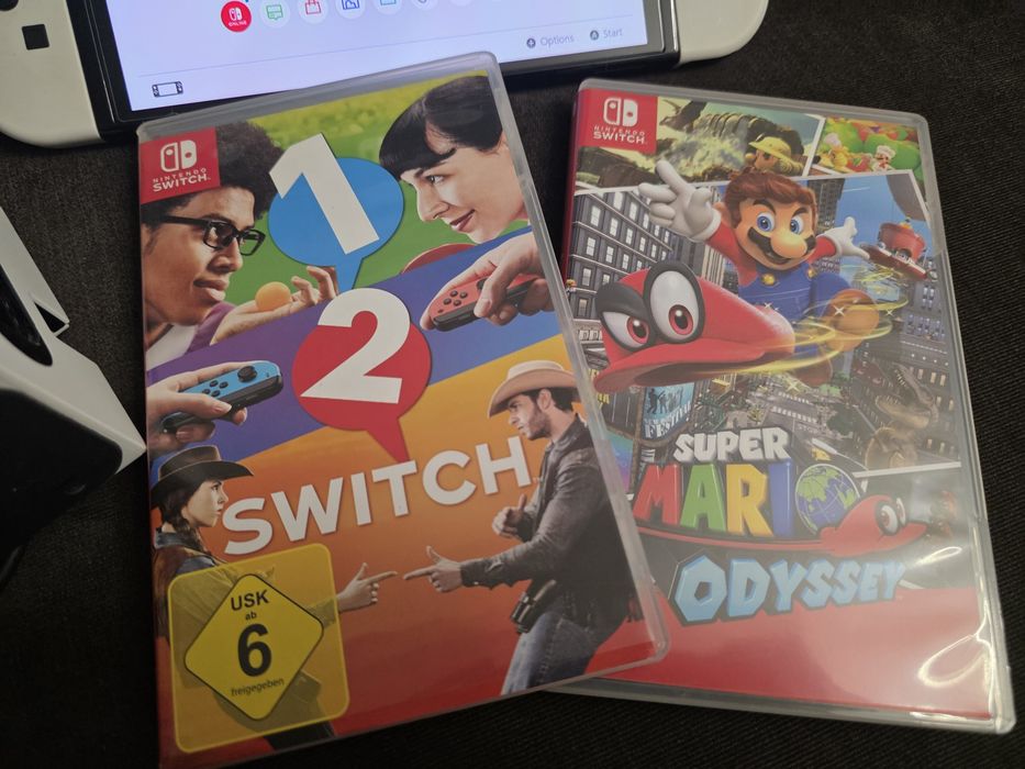 Nintendo switch Oled + 4 gry