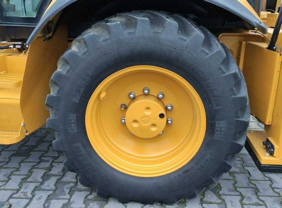 Екскаватор-навантажувач Caterpillar 444E