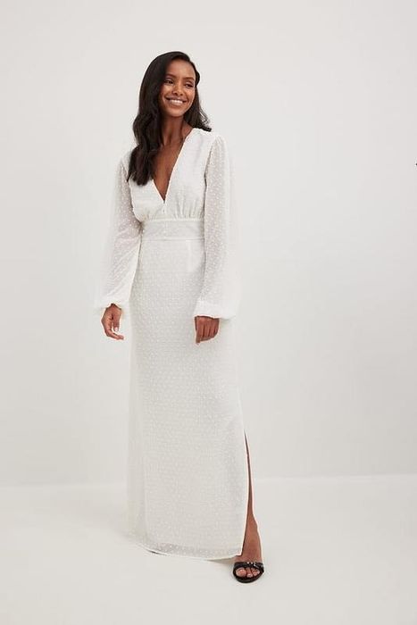 Весільна або вечірня сукня в біло-молочному кольорі