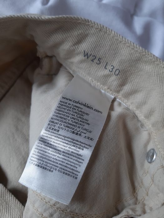 Jeansy beżowe Calvin Klein