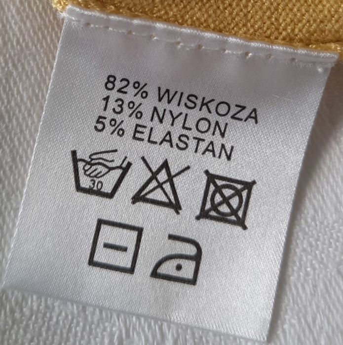 Zapinany sweterek kardigan marki Solar