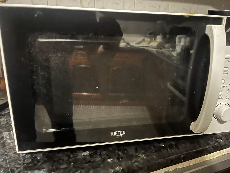 Microondas usado com relogio